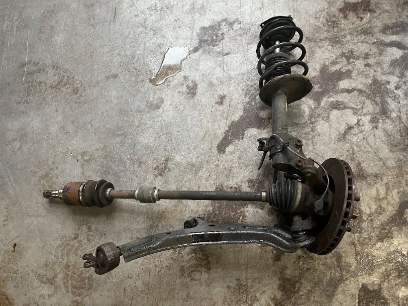 F SUSPENSION ASSY RH